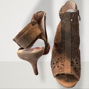 Vince Camuto Suede cutout peep toe heels with zipped side & accent buckle.